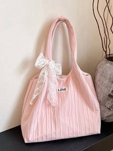 Pink pleated tote bag with LOVE patch and white lace bow detail for sweet casual style