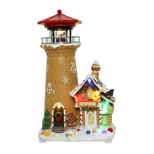 Illuminated Christmas candy shop cottage with lighthouse and festive music function
