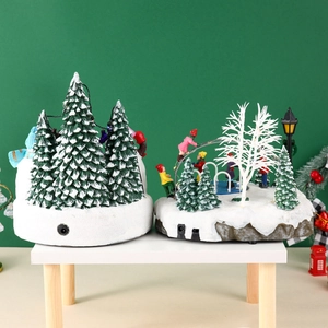 Detail of Christmas resin house base showing power port and switch for lighting