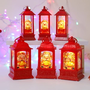 Detail of 6pcs red festive lantern lights featuring cartoon God of Wealth with warm glow