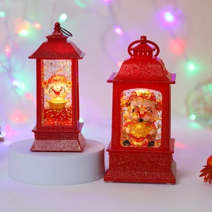 Festive red lantern night lights featuring God of Wealth figurines with golden sequins