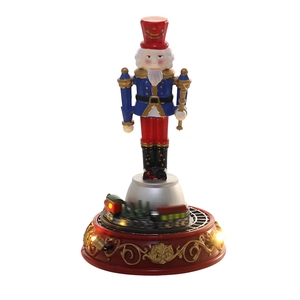 Cascanueces navideño con tren giratorio y base con iluminación LED decorativa