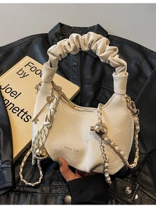 Chic pleated cloud bag in beige with gold chain and unique bell charm decoration