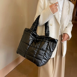 Quilted black puffer tote bag with ruched handles for women's casual street style