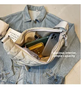 Detailed interior of quilted crossbody bag showing spacious storage for essentials