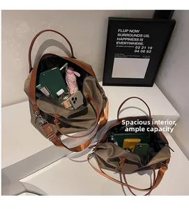 Detail view of khaki nylon tote bag interior showing large capacity for travel essentials