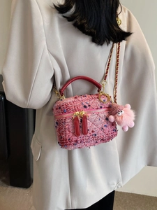 Pink tweed crossbody bag with diamond stitching, gold chain strap and plush charm