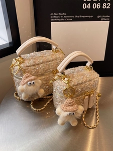 Quilted tweed vanity handbag with gold chain strap and plush monster charm set