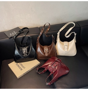 Detail showing high-gloss pleated PU leather hobo bags in four retro colors