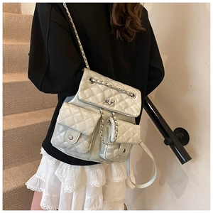 Rear view of a light grey quilted PU leather backpack featuring silver chain straps