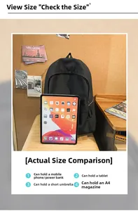 Detail view of large capacity black backpack showing storage for tablet and A4 magazine