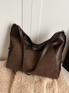 Deep brown suede and leather patchwork tote bag with silver buckle for office commuting