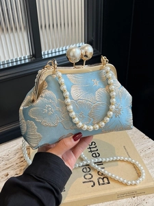 Light blue vintage embroidery handbag with pearl handles and floral jacquard pattern
