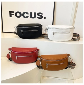 Detailed view of four colorful lychee grain leather saddle bags with striped straps