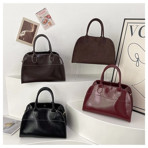 Multiple views of retro tote bags in various colors and finishes on minimalist white steps