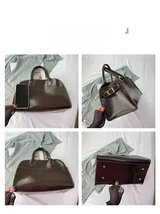 Detailed views of vintage brown tote bag with contrast stitching and golden hardware
