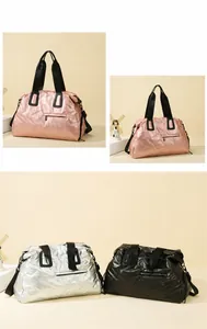 Detailed view of quilted metallic sports gym bags in pink, silver, and black colors
