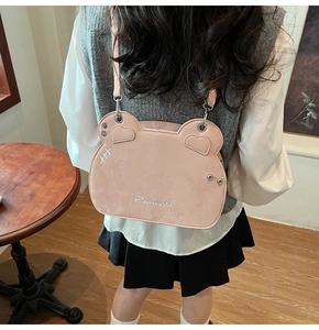 Detail of pink bear-shaped crossbody bag with Princess embroidery and heart-shaped ears