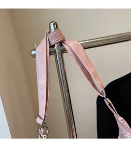 Pink large capacity tote bag featuring durable leather straps and silver metal rings