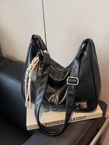 Vintage large black PU leather tote bag with silver hardware and tennis charm detail