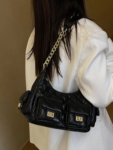 Chic black quilted shoulder bag with gold chain strap and multiple pockets