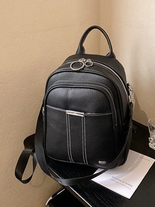 Chic black pebbled leather backpack with silver ring zippers and large capacity