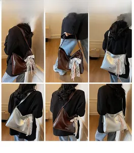 Detailed views of high-capacity bucket bags in dark brown and silver with lace ribbons
