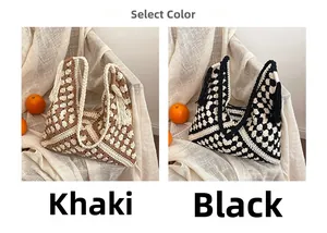 Detail of bohemian crochet beach bags in khaki and black with tassels and woven straps