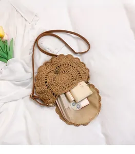 Detail of bohemian hand-woven bag interior showing spacious storage for essentials