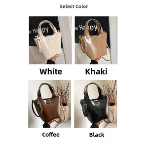 Selección de elegantes bolsos bombonera en blanco, caqui, marrón y negro con texturas finas
