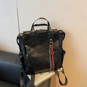Vintage PU Leather Backpack For Women Large Capacity Casual Travel School Bag Retro Versatile Commuting Handbag With Pendant