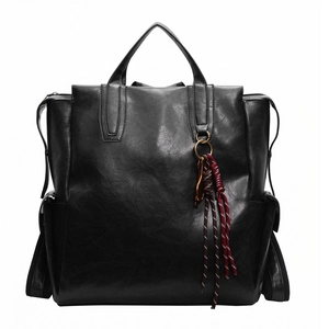 Vintage black PU leather backpack and handbag combo with stylish braided tassel detail