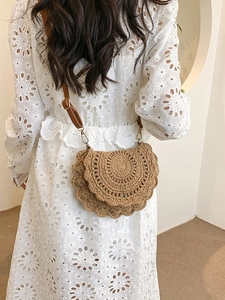 Bohemian hand-woven round crossbody bag with scallop edges and adjustable leather strap