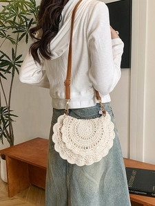 Bohemian crochet crossbody bag in beige with tiered scalloped edges and adjustable strap