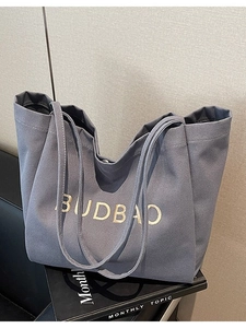 Minimalist grey canvas tote bag with BUDBAO embroidery and large shoulder straps for daily use