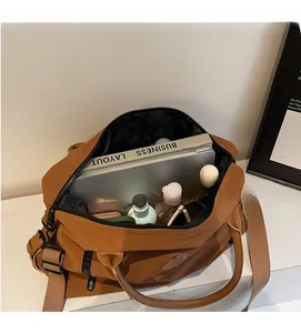 Interior view showing the large capacity and multiple compartments of the travel duffel bag