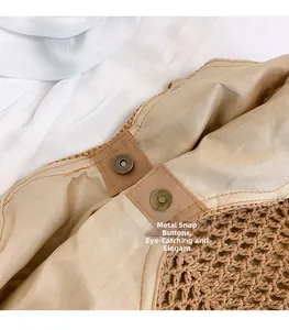 Detail of woven tote bag featuring a high-quality magnetic metal clasp and durable lining