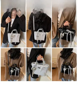 Collage of model showcasing white and black bucket bags in handheld and crossbody styles