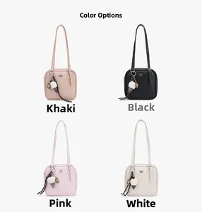 Detail showing square shoulder bags in khaki, black, pink, and white with ice cream charms