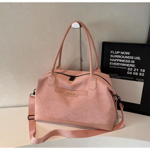 Sac fourre-tout rose en similicuir avec poignées, bandoulière en tissu et logo NINGJIA