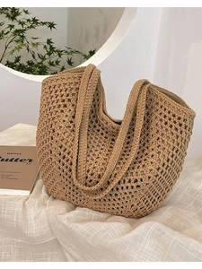 Large woven hollow tote bag in natural light brown for summer beach vacations and daily use
