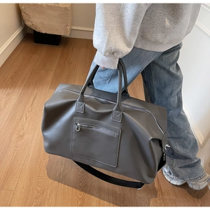 Grand sac de voyage gris foncé en similicuir avec bandoulière amovible
