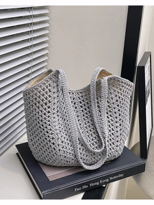 Handcrafted grey crochet knit tote bag with mesh texture and inner lining for beach vacations
