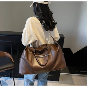 Sac de voyage en cuir PU marron avec doubles poignées et bandoulière amovible en nylon noir