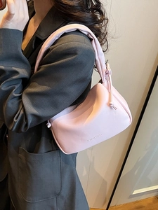 Pink oversized cloud-shaped shoulder bag in leather with thick cylindrical strap