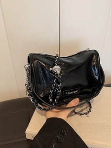 Elegant black patent leather handbag with silver chain strap and metal FASHION logo
