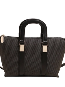 Minimalist woven bucket bag in dark grey with leather handles and silver accents