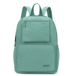 Vue de face du sac à dos en nylon imperméable vert menthe avec deux poches zippées