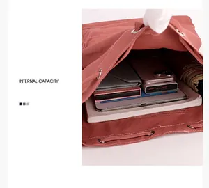 Spacious internal capacity of pink drawstring backpack holding tablet and daily essentials