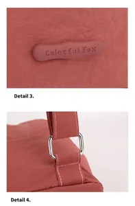 Detail of Colorful Fox bag showing rubber logo branding and silver metal strap connectors
